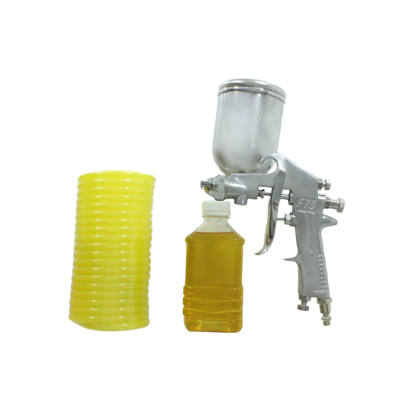 Pistola de pintura a presión F75, manguera de aire amarilla y botella con líquido para recubrimientos. Equipo de ferretería.