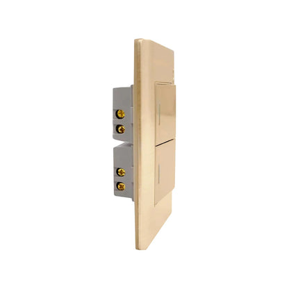 Placa de 2 apagadores de escalera color rose gold vista lateral, con terminales eléctricas expuestas.