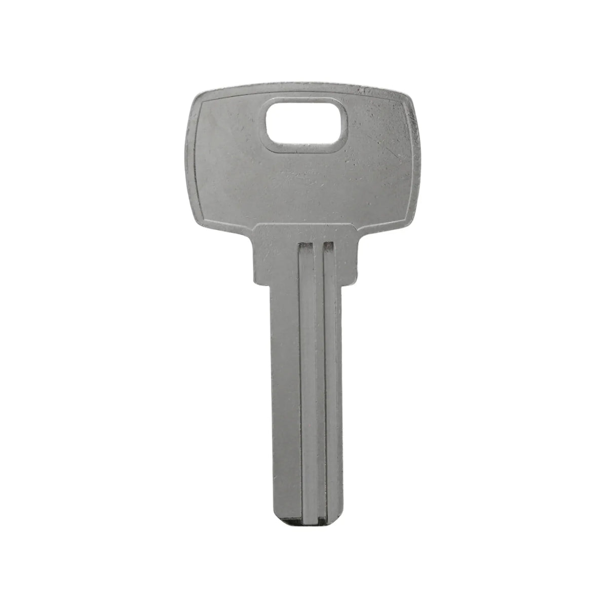 Llave virgen de metal plateada con doble ranura para duplicado de llaves y servicios de cerrajería profesional.