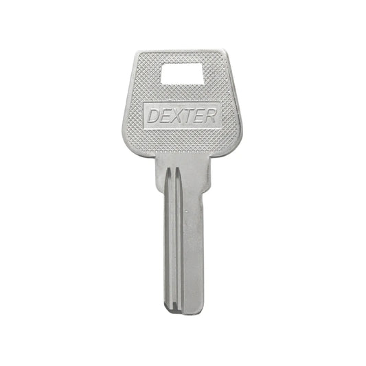 Llave virgen marca Dexter color plata para duplicados de cerrajería en puertas y cilindros residenciales.