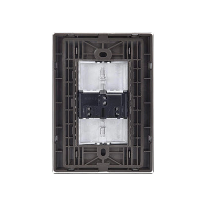 Marco modular para 2 módulos eléctricos, gris oscuro, vista trasera para montaje de apagadores y tomas.
