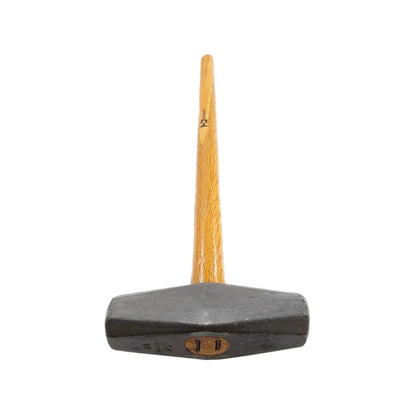Marro tipo nevada 10 libras, cabeza de acero forjado gris oscuro y mango de madera para trabajos de demolición.