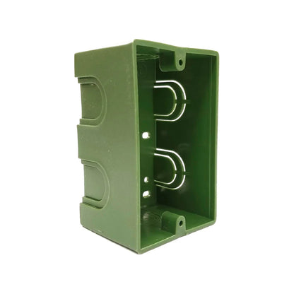Chalupa eléctrica plástica verde para empotrar en pared, ideal para interruptores y contactos de corriente.